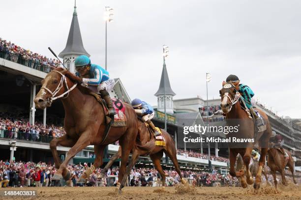 Mage, ridden by jockey Javier Castellano crosses the finish line to win the 149th running of the Kentucky Derby at Churchill Downs on May 06, 2023 in...