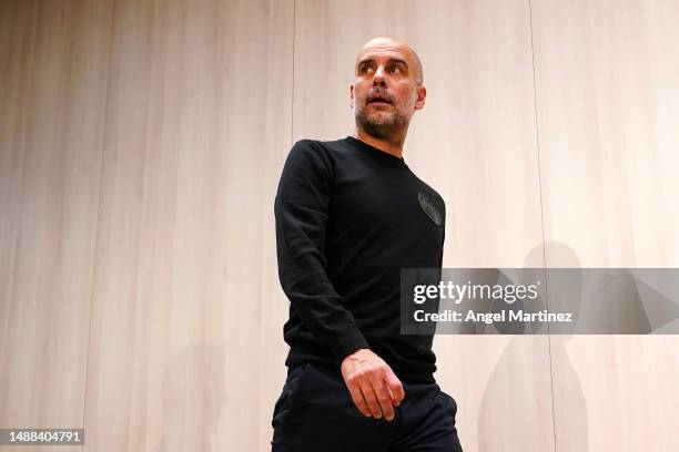 Pep Guardiola, Manager of Manchester City, arrives at the Press Conference ahead of their UEFA Champions League semi-final first leg match against...
