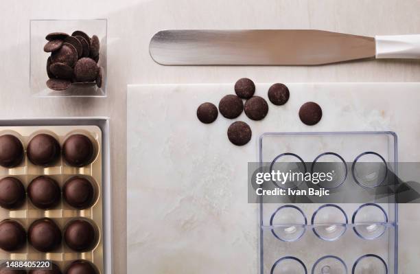 making chocolate truffles - spatula stock pictures, royalty-free photos & images
