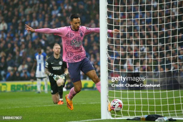 Dwight McNeil of Everton celebrates as he scores the team's fourth goal during the Premier League match between Brighton & Hove Albion and Everton FC...