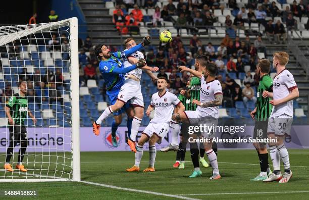 Andrea Consigli of US Sassuolo makes a save against Lewis Ferguson of Bologna FC during the Serie A match between US Sassuolo and Bologna FC at Mapei...