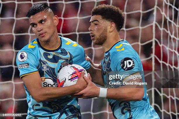 Carlos Alcaraz of Southampton celebrates with teammate Che Adams after scoring the team's first goal during the Premier League match between...