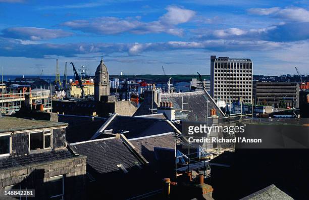 view over city rooftops looking towards the harbour. - aberdeen scotland city stock pictures, royalty-free photos & images