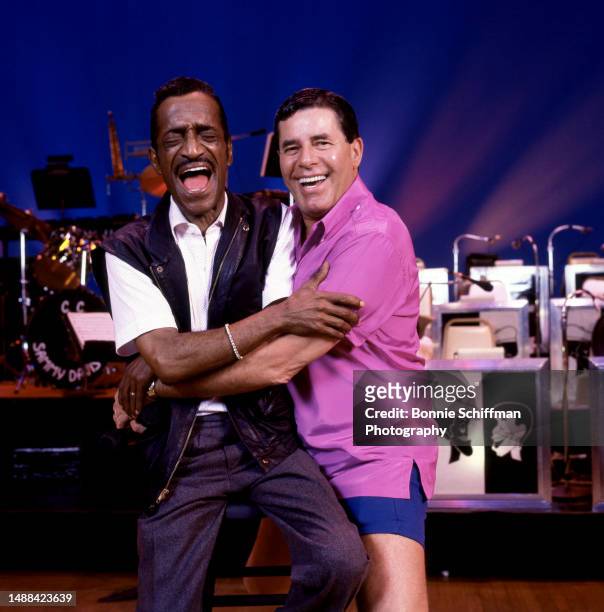 American actor and comedian Sammy Davis Jr. And American actor and comedian Jerry Lewis fool around during The Jerry Lewis Telethon for Muscular...