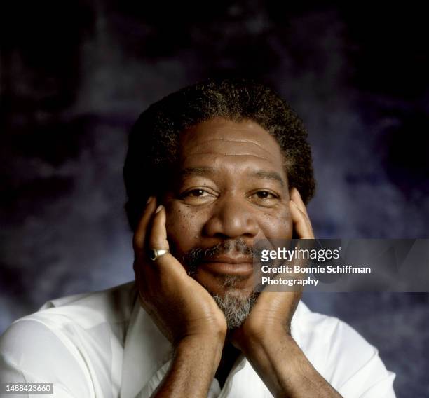 American actor, producer, and narrator Morgan Freeman poses for a portrait with his chin resting on his hands in Los Angeles, California, circa 1990.