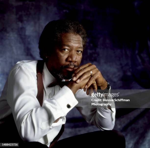 American actor, producer, and narrator Morgan Freeman clasps his hands together in Los Angeles, California, circa 1990.