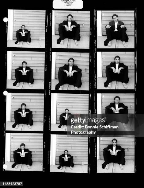 American actor Andy Garcia poses for a portrait sitting on the ground in these twelve images in Los Angeles, California, October 6, 1987.