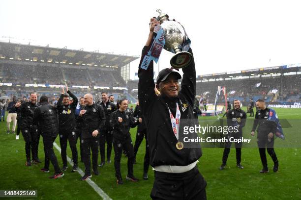 Vincent Kompany, Manager of Burnley celebrates with the Sky Bet Championship trophy celebrating promotion to the Premier League after defeating...
