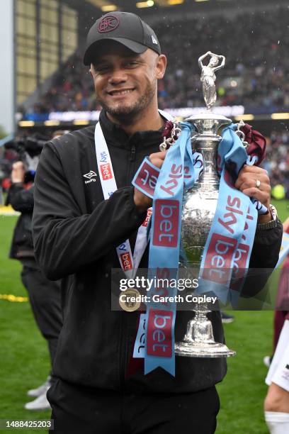 Vincent Kompany, Manager of Burnley celebrates with the Sky Bet Championship trophy celebrating promotion to the Premier League after defeating...