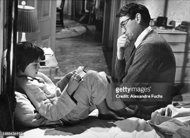 Actor Gregory Peck and actress Mary Badham in a scene of the film "To Kill A Mockingbird", in 1961 at Monroeville, Alabama.