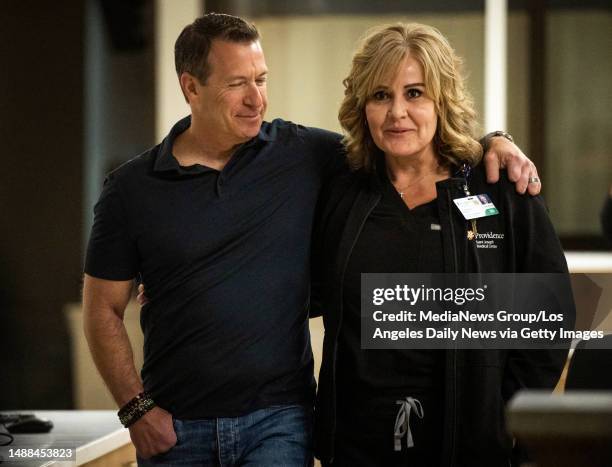 Los Angeles, CA Gregg Garfield, who is Providence Saint Joseph Medical Centers COVID-19 patient zero, visits with emergency nurse director Debbie...