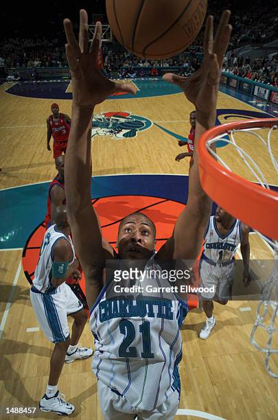 Jamaal Magloire of the Charlotte Hornets rebounds against the Los Angeles Clippers at the Charlotte Coliseum in Charlotte, North Carolina. DIGITAL...