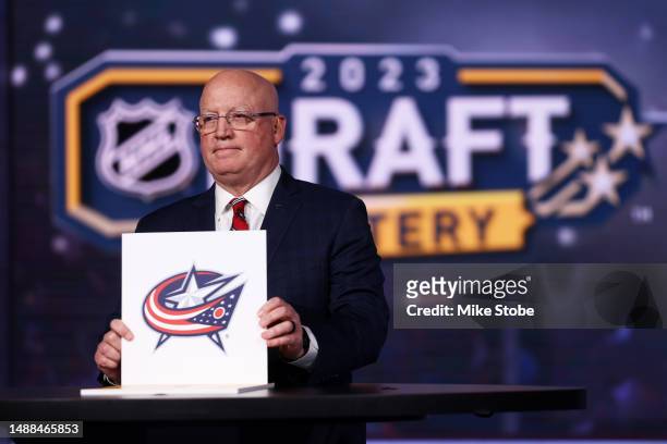 National Hockey League Deputy Commissioner Bill Daly announces the Columbus Blue Jackets overall draft position during the 2023 NHL Draft Lottery on...