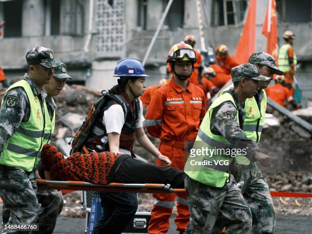 Militias attend an earthquake rescue drill on May 8, 2023 in Leshan, Sichuan Province of China. The drill site was simulated scenes of earthquake...