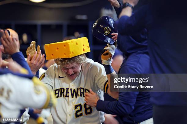 Joey Wiemer of the Milwaukee Brewers is congratulated by teammates following a three run home run against the Los Angeles Dodgers during the fifth...