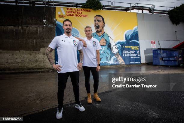 Melbourne City player Jamie Maclaren poses with Melbourne City player and artist Hannah Wilkinson during a media opportunity as a mural for A-League...