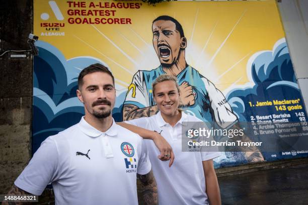 Melbourne City player Jamie Maclaren poses with Melbourne City player and artist Hannah Wilkinson during a media opportunity as a mural for A-League...