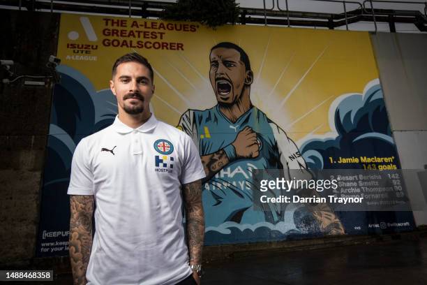 Melbourne City player Jamie Maclaren poses in front of art work by Melbourne City player and artist Hannah Wilkinson during a media opportunity as a...