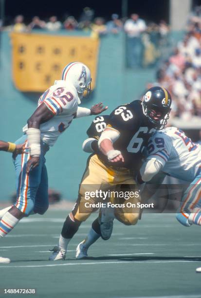Thom Dornbrook of the Pittsburgh Steelers blocks against the Houston Oilers during an NFL football game on September 9, 1979 at Three Rivers Stadium...