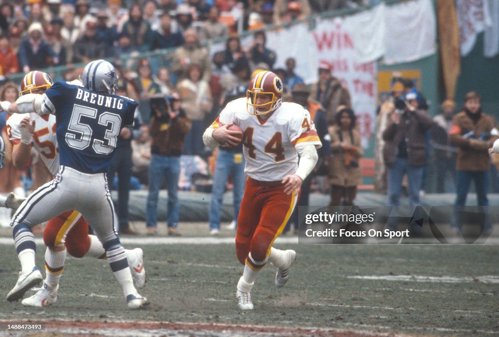 44 Redskins John Riggins John Riggins of the Washington Redskins runs the ball against the ...