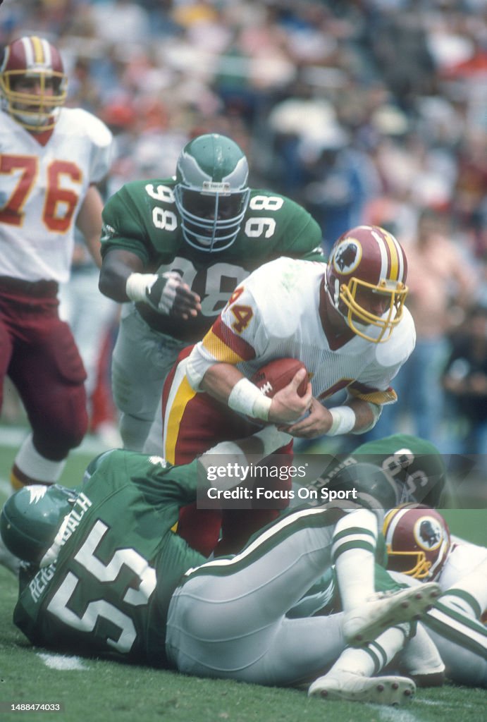 44 Redskins John Riggins John Riggins of the Washington Redskins runs the ball against the ...