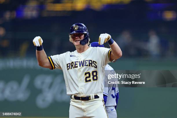 Joey Wiemer of the Milwaukee Brewers celebrates an RBI double against the Los Angeles Dodgers during the seventh inning at American Family Field on...