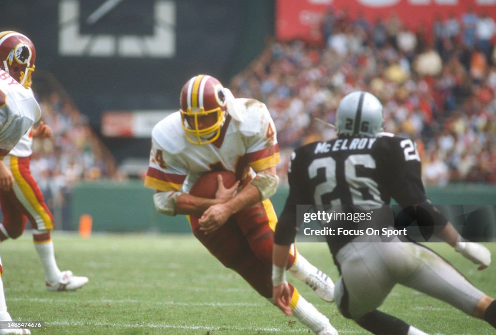 44 Redskins John Riggins John Riggins of the Washington Redskins runs the ball during an NFL ...