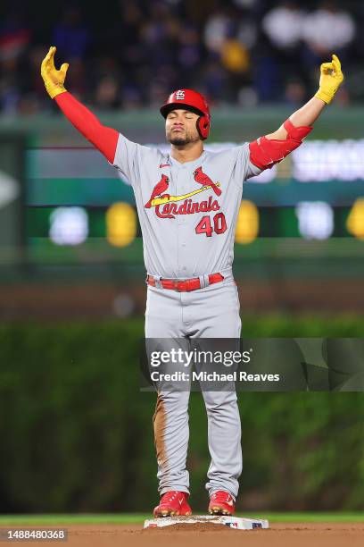 Willson Contreras of the St. Louis Cardinals reacts after hitting a RBI double against the Chicago Cubs during the sixth inning at Wrigley Field on...