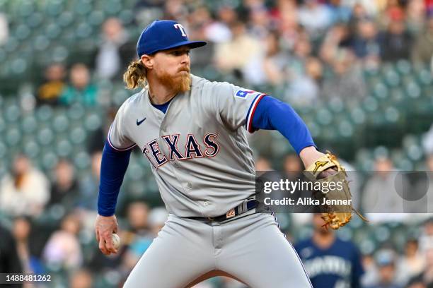 Jon Gray of the Texas Rangers throws a pitch during the first inning against the Seattle Mariners at T-Mobile Park on May 08, 2023 in Seattle,...