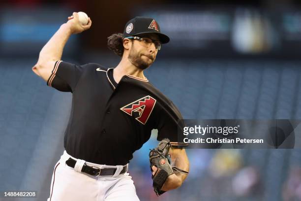 Starting pitcher Zac Gallen of the Arizona Diamondbacks pitches against the Miami Marlins during the first inning of the MLB game at Chase Field on...