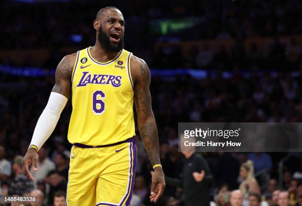 LeBron James of the Los Angeles Lakers reacts against the Golden State Warriors during the first quarter in game four of the Western Conference...