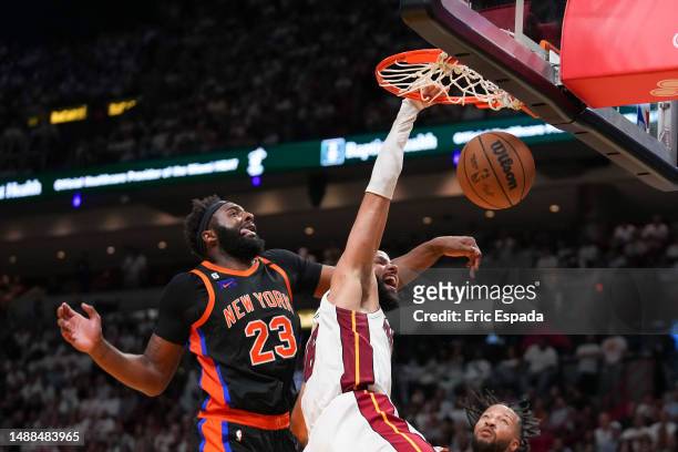 Caleb Martin of the Miami Heat dunks the basketball during game four of the Eastern Conference Semifinals against the New York Knicks at Kaseya...