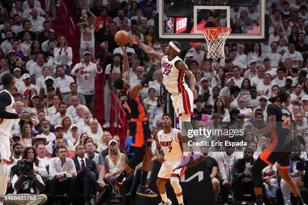 Jimmy Butler of the Miami Heat blocks a shot attempt by RJ Barrett of the New York Knicks during Game Four of the Eastern Conference Semifinals at...