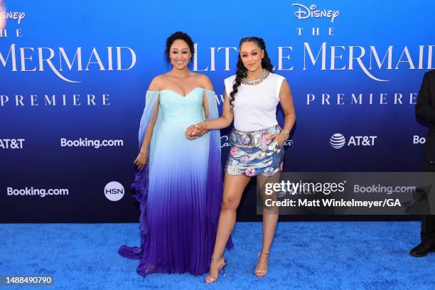 Tamera Mowry-Housley and Tia Mowry attend the world premiere of Disney's "The Little Mermaid" on May 08, 2023 in Hollywood, California.