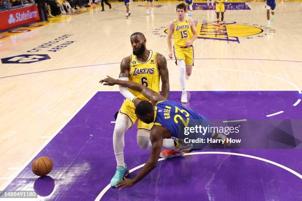 LeBron James of the Los Angeles Lakers fouls Draymond Green of the Golden State Warriors during the second quarter in game four of the Western...