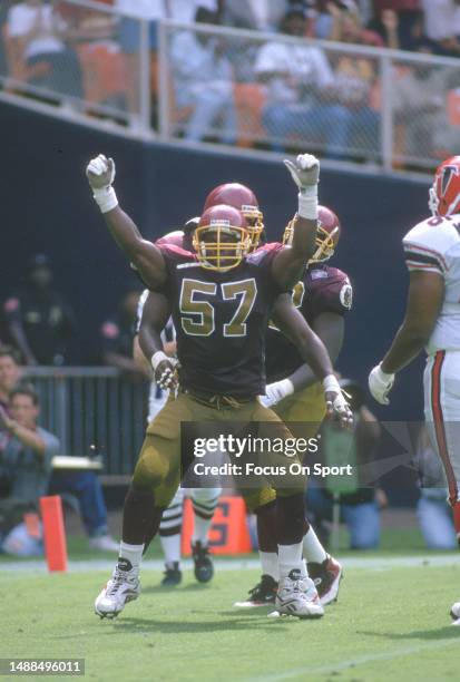 Ken Harvey of the Washington Redskins celebrates against the Atlanta Falcons during an NFL football game September 25, 1994 at RFK Stadium in...