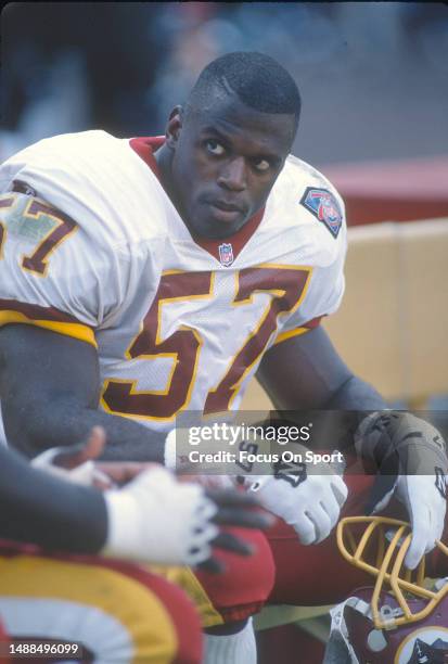 Ken Harvey of the Washington Redskins looks on against the Dallas Cowboys during an NFL football game October 2, 1994 at RFK Stadium in Washington...