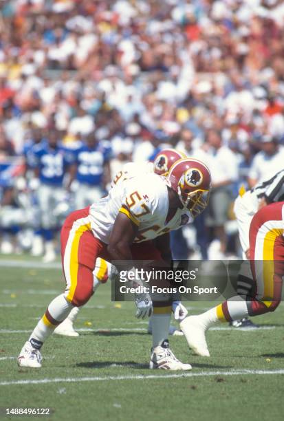 Ken Harvey of the Washington Redskins looks into the backfield against the Seattle Seahawks during an NFL football game September 4, 1994 at RFK...