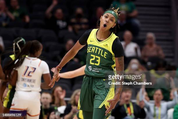 Jordan Horston of the Seattle Storm reacts after a three point basket against the Phoenix Mercury in a WNBA preseason game at Climate Pledge Arena on...