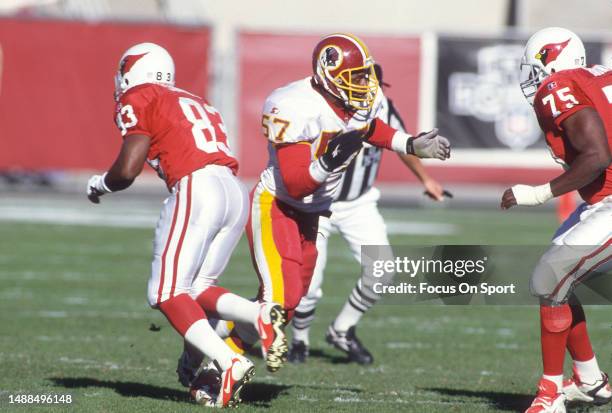 Ken Harvey of the Washington Redskins pass rushes against the Arizona Cardinals during an NFL football game on December 15, 1996 at Sun Devil Stadium...