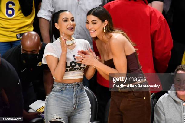 Kim Kardashian and Sarah Staudinger attend a playoff basketball game between the Los Angeles Lakers and the Golden State Warriors at Crypto.com Arena...