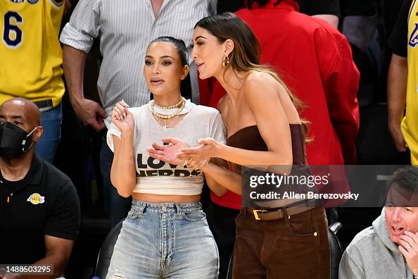 Kim Kardashian and Sarah Staudinger attend a playoff basketball game