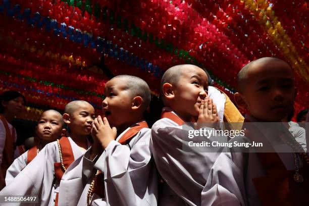 South Korean child monks attend during a ceremony to prepare children to live as Buddhist monks for three weeks at Jogyesa Temple on May 09, 2023 in...