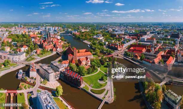 aerial view of wroclaw downtown with odra river in poland - oude stad stockfoto's en -beelden