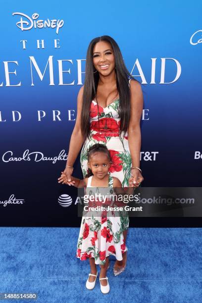 Kenya Moore and a guest attend the World Premiere of Disney's live-action feature "The Little Mermaid" at the Dolby Theatre in Los Angeles,...