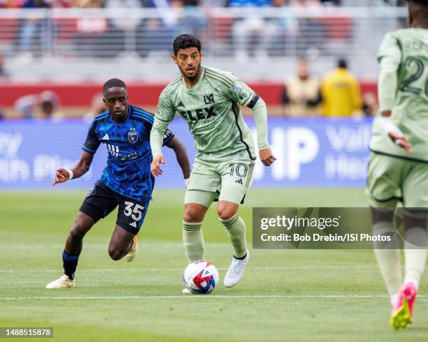 Carlos Vela of Los Angeles FC advances the ball during a game between Los Angeles FC and San Jose Earthquakes at Levi's Stadium on May 6, 2023 in...