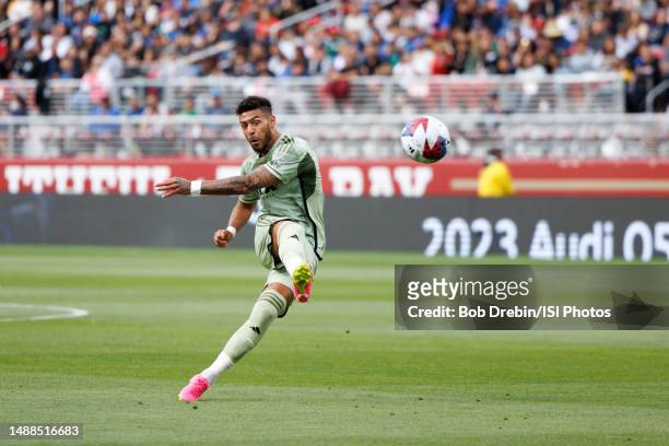 Denis Bouanga of Los Angeles FC kicks the ball during a game between Los Angeles FC and San Jose Earthquakes at Levi's Stadium on May 6, 2023 in...