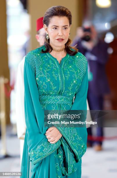 Princess Lalla Meryem of Morocco attends a reception at Buckingham Palace for overseas guests ahead of the Coronation of King Charles III and Queen...