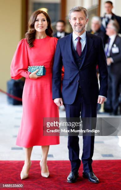 Crown Princess Mary of Denmark and Crown Prince Frederik of Denmark attend a reception at Buckingham Palace for overseas guests ahead of the...
