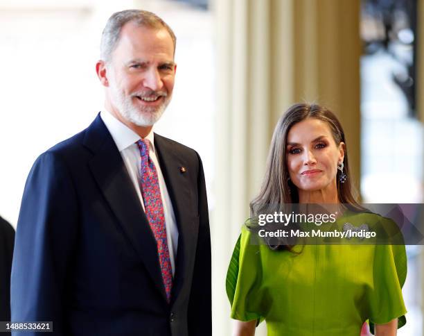 King Felipe VI of Spain and Queen Letizia of Spain attend a reception at Buckingham Palace for overseas guests ahead of the Coronation of King...